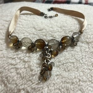 Brown and clear beaded necklace